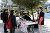 Students stand around a table with a sign that reads I Quit ChatGPT on the CSUSB Campus