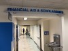 Students line up at the Financial Aid and Scholarships office at CSUSB to ask questions about their financial status